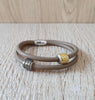 Taupe double-wrap leather bracelet decorated with Austrian pavé elements