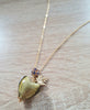 Long gold necklace with Olive Murano heart and Austrian crystal ball