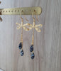 18K gold plated dragonfly earrings handmade with "Black Silver Night" Swarovski crystal drops on jewellery display