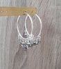 Silver hoop earrings with Black Diamond Austrian crystals