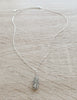 Short silver necklace with a grey Austrian crystal pavé pendant