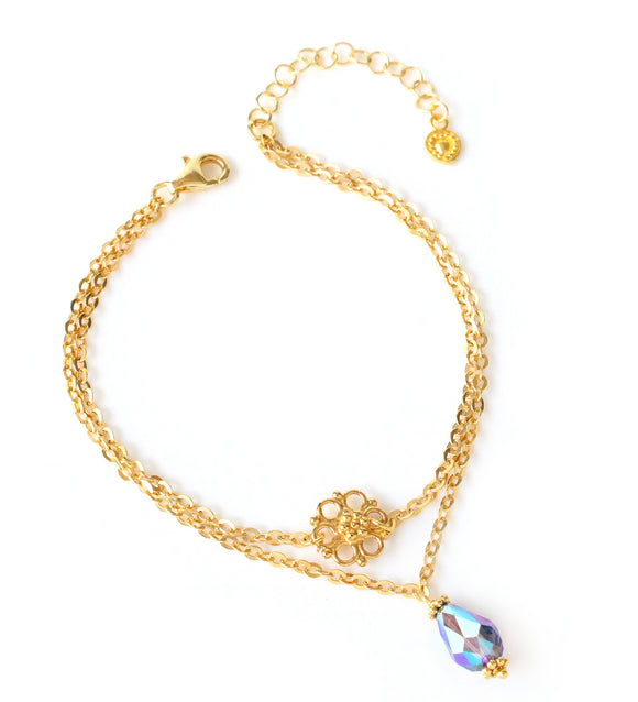 Gold double-chain flower bracelet with a Tanzanite AB Austrian drop