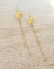 Long gold plated seashell earrings