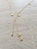 Dige Designs gold seashell wrap necklace