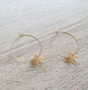 18K gold plated hoop earrings featuring butterfies and Swarovski balls