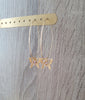 18K gold plated hoop earrings with butterfies and Swarovski balls on jewellery display
