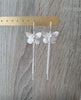 Silver butterfly dangle earrings with crystals