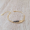 Gold double chain bracelet with black Austrian crystals