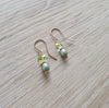 Olive pearl earrings with peridot Austrian crystal butterflies