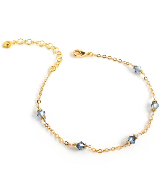 Gold bracelet with Denim blue Austrian crystals