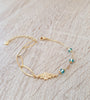 Gold link bracelet with Indicolite Austrian crystals