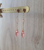 18K gold plated pink stud earrings with Rose Peach Austrian crystal drops on dipslay