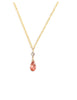 Short gold necklace with a Austrian Rose Peach drop