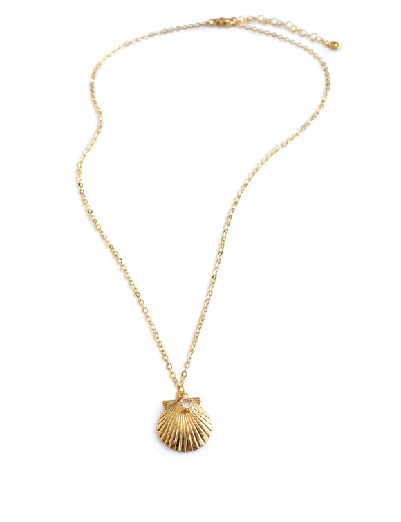 Dige Designs short gold seashell necklace with a Golden Shadow crystal