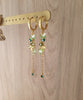 Gold hoop earrings with Peridot butterflies and clover