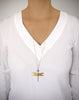 Long gold dragonfly necklace with a Tanzanite Austrian crystal