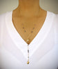 Gold seashell Y necklace with Black Diamond Austrian crystals