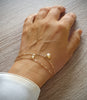 Gold seashell bracelet with Austrian crystal butterfly