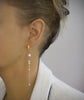 Long hoop earrings with freshwater pearls and Austrian crystals