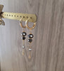 18K gold plated hoop earrings with Black Silver Night Swarovski crystals on display