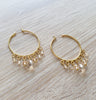 18K gold plated hoop earrings featuring Golden Shadow Swarovski crystals