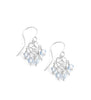 Rhodium plated heart filigree earrings with Blue Shade Swarovski crystals