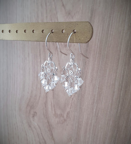 Rhodium plated heart filigree earrings with clear Swarovski crystals