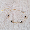 18K gold plated bracelet handmade and adorned with sparkling black Swarovski crystals.