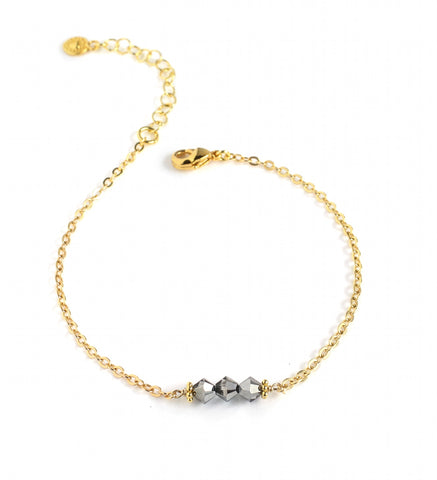 Dige Designs 18K gold plated bracelet decorated with Black Silver Night Swarovski crystals.