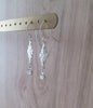 Rhodium plated flowerlink earrings with clear Swarovski crystals