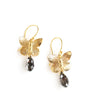 18K gold plated butterfly earrings adorned with "Black Silver Night" Swarovski crystal drops.