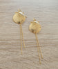 Long-length 18K gold plated seashell statement earrings with dangling chains.