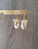 18K gold plated dragonfly earrings with Golden Shadow Swarovski crystal drops on jewellery display