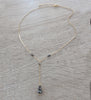 18K gold plated Y-necklace featuring "Black Silver Night" Swarovski crystals.