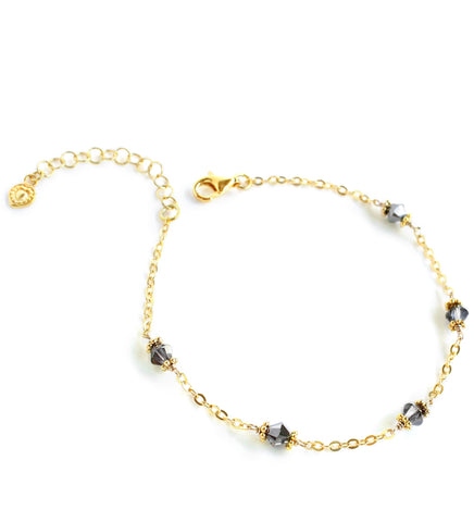 18K gold plated bracelet decorated with sparkling Black Silver Night Swarovski crystals.