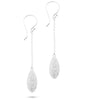 Rhodium plated dangle earrings decorated with sparkling white Swarovski crystal pavé pendants.