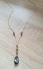Long gold necklace with black diamond Swarovski crystals