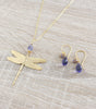 Long gold dragonfly necklace with a Tanzanite Austrian crystal