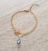 Gold double-chain flower bracelet with a Tanzanite AB Austrian drop