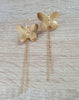 Stylish long-length 18K gold plated statement butterfly earrings.