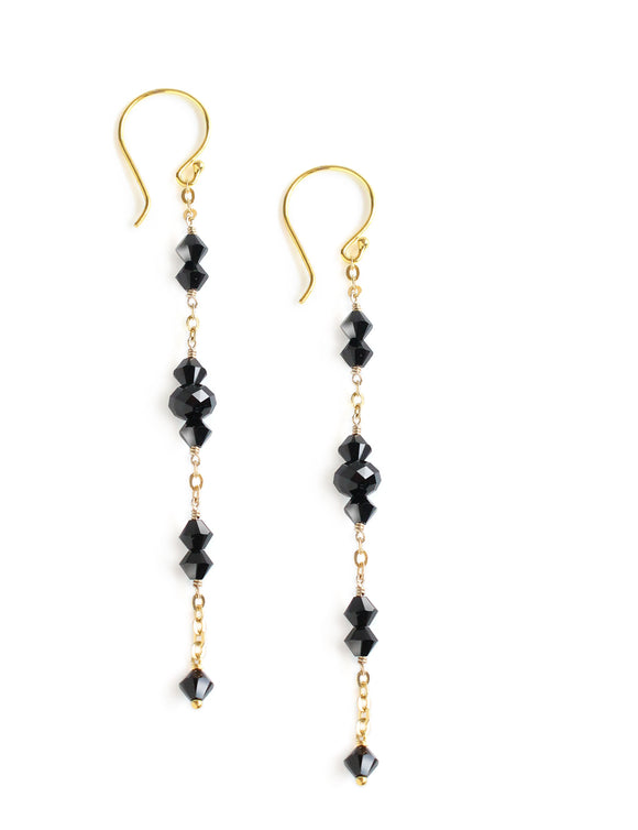Gold dangle earrings with black Austrian crystals