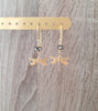 Dige Designs gold dragonfly earrings with black diamond Swarovski crystals
