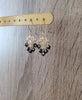 Gold heart filigree earrings with black Swarovski crystals