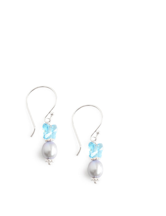 Silver earrings with light blue freshwater pearls and Austrian crystal butterflies