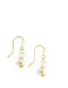 Gold earrings with white freshwater pearls and Austrian crystal butterflies