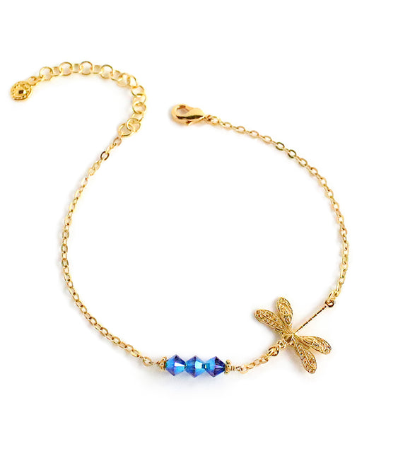 Dige Designs gold dragonfly bracelet with Montana AB blue Swarovski crystals