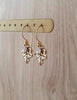 Gold leaf earrings with crystals