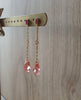 18K gold plated pink stud earrings handmade with Rose Peach Austrian crystal drops on display