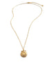 Dige Designs short gold seashell necklace with a Golden Shadow crystal