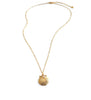 Dige Designs short gold seashell necklace with a Golden Shadow crystal